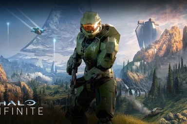 Halo Infinite: master Chief stood in a large valley with a spaceship flying in the distance.